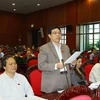Đại biểu Quốc hội tỉnh Nghệ An, Phan Văn Quý phát biểu ý kiến. (Ảnh: Doãn Tấn/TTXVN)