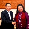 Tổng Bí thư, Chủ tịch nước Chummaly Saynha sone tiếp Phó Chủ tịch Quốc hội Tòng Thị Phóng. (Ảnh: Hoàng Chương/TTXVN)