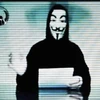 Một thành viên của Anonymous trong trang phục đặc trưng. (Nguồn: AFP)