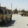 Binh sỹ quân đội quốc gia Afganistan triển khai tại hiện trường vụ tấn công ở tỉnh Kandahar. (Ảnh: THX/TTXVN)