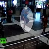 Nghi can đánh bom đang đứng trong phòng đón khách ở sân bay Burgas. (Nguồn: RT) 