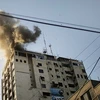 Những cột khói ở Al-Aqsa đài truyền hình địa phương tại thành phố Gaza ở phía Bắc dải Gaza vào ngày 18/11 vừa qua. (Nguồn: Getty Images)