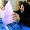 Cử tri Iraq bỏ phiếu tại một địa điểm bầu cử ở Baghdad. (Ảnh: THX/TTXVN)