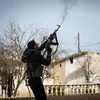 Một tay súng thuộc lực lượng đối lập Syria. (Ảnh: AFP/TTXVN)