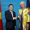 Chủ tịch nước Trương Tấn Sang gặp Giám đốc điều hành Quỹ Tiền tệ Quốc tế (IMF), bà Christine Largade. (Ảnh: Nguyễn Khang/TTXVN)