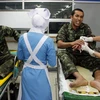 Điều trị cho binh sĩ bị thương tại một tỉnh ở miền nam Thái Lan. (Ảnh: AFP/ TTXVN)