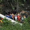 Nhân viên cứu hộ đang đứng trước mỏ than bị nổ tại Colombia ngày 17/6. (Nguồn: Reuters)