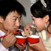 Một cặp vợ chồng Trung Quốc hạnh phúc trong ngày cưới. Ảnh minh họa. (Nguồn: Internet)