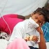 Các bệnh nhân nhiễm tả điều trị tại bệnh viện ở Port-au-Prince ngày 10/11. (Nguồn: AFP/TTXVN)