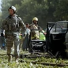 Binh sỹ Mỹ tại hiện trường một vụ đánh bom ở Afghanistan. (Nguồn: AFP/TTXVN)