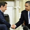 Tổng thống Mỹ Obama bắt tay người đồng cấp Sarkozy tại Nhà Trắng ngày 10/1. (Nguồn: Getty Images)