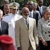 Tổng thống Haiti Rene Preval (ở giữa). (Nguồn: AFP/TTXVN)