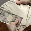 Những tờ tiền mệnh giá 10.000 yen tại Tokyo, Nhật Bản. (Nguồn: AFP/TTXVN)