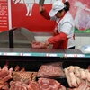 Một quầy bán thịt lợn ở thành phố Tế Nam, tỉnh Sơn Đông. (Nguồn: THX/TTXVN)