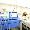 Bệnh nhân, bị nhiễm khuẩn E.coli, tại bệnh viện trường đại học Eppendorf ở Hamburg, Đức ngày 1/6. (Nguồn: Internet)