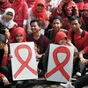 Sinh viên tham gia chiến dịch phòng chống căn bệnh HIV/AIDS. (Nguồn: AFP/TTXVN)