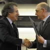Tổng thống Uruguay và người đồng cấp Argentina Hector Timerman sau khi ký thỏa thuận hợp tác. (Nguồn: Getty Image) 