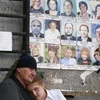 Ảnh các nạn nhân trong vụ thảm sát ở thị trấn Besla hồi năm 2004. (Nguồn: Reuters)