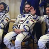 Nhà du hành vũ trụ người Mỹ Ron Garan (phải), và hai nhà du hành người Nga Alexander Samokutyayev (giữa) and Andrei Borisenko (trái). (Nguồn: presstv.ir)