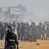 Biểu tình bạo động trước bầu cử Tổng thống vòng hai. (Nguồn: AFP/TTXVN)