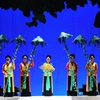 Một cảnh trong vở diễn "Thương nhớ trầu cau" do các nghệ sỹ Nhà hát chèo quân đội biểu diễn. (Ảnh: Minh Đức/TTXVN)