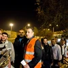 Quan sát viên thuộc Liên đoàn Arập (áo vàng) ở Damascus ngày 15/1. (Nguồn: THX/TTXVN) 