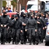 Cảnh sát đặc nhiệm Pháp sau cuộc đột kích vào ngôi nhà nghi phạm Mohamed Merah ẩn náu tại Toulouse. (Nguồn: AFP/TTXVN)