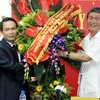 Ông Đinh Thế Huynh, Trưởng Ban Tuyên giáo Trung ương, đến thăm TTXVN. (Ảnh : Nguyễn Dân/TTXVN)