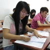Các thí sinh thi môn văn tại Hội đồng thi trường ĐH Tôn Đức Thắng, TP.HCM. (Ảnh: Phương Vy/TTXVN)
