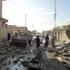 Tòa nhà bị phá hủy trong vụ nổ bom xe ở Kirkuk ngày 14/11. (Nguồn: AFP/TTXVN)