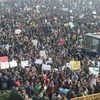 Người biểu tình tuần hành trước dinh Tổng thống ở New Delhi yêu cầu bảo vệ nữ giới ngày 22/12. (Nguồn: AFP/TTXVN)