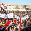 Biểu tình phản đối chính phủ tại Samarra, thủ phủ tỉnh Salaheddin, Iraq hồi tháng 12 vừa qua. (Nguồn: AFP/TTXVN)