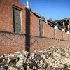 Nhiều ngôi nhà bị phá hủy sau trận mưa thiên thạch ở Chelyabinsk, cách thủ đô Mátxcơva khoảng 1.500km về phía Đông. (Nguồn: AFP/TTXVN)