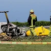 Chiếc trực thăng tan tành sau vụ tai nạn. (Nguồn: The Daily Telegraph)