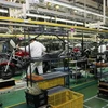 Dây chuyền sản xuất xe máy tại một nhà máy của Honda. (Nguồn: mbike.com)