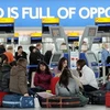 Hành khách phải chờ đợi tại sân bay do các chuyến bay bị hủy. (Nguồn: Getty Images)