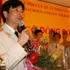 Chủ tịch ban liên lạc Nguyễn Ánh Sao và một số đồng đội tại lễ kỷ niệm. (Ảnh: Thanh Hải/Vietnam+) 