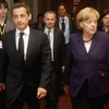 Tổng thống Pháp và Thủ tướng Đức tại Hội nghị thượng đỉnh bất thường của lãnh đạo các nước sử dụng đồng euro. (Nguồn: Getty Images)