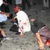 Các nạn nhân tại hiện trường vụ đánh bom.(Nguồn: AFP/TTXVN)
