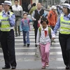 Triển khai nhân viên an ninh và cảnh sát tại các trường học của Trung Quốc. (Nguồn: Getty Images)