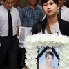 Lễ tang người phụ nữ Việt Nam bị chồng sát hại tại Busan, ngày 15/7. (Nguồn: Yonhap/TTXVN)