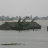 Cảnh ngập lụt ở xã Hạ Trạch, huyện Bố Trạch. (Ảnh: Đức Thọ/TTXVN)