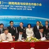 Lễ ký kết các hạng mục hợp tác giữa doanh nghiệp Việt Nam và doanh nghiệp tỉnh Hồ Nam. (Ảnh: Văn Điệp/TTXVN)