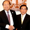 Bộ trưởng Phankham Viphavan trong buổi tiếp Bộ trưởng Hoàng Tuấn Anh. (Ảnh: Hoàng Chương/Vietnam+)
