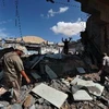 Tòa nhà bị phá hủy ở thành phố Sirte ngày 9/10. (Nguồn: AFP/TTXVN)