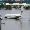 Cảnh ngập lụt tại sân bay Don Muang.(Nguồn: AFP/TTXVN)