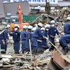 Khắc phục hậu quả động đất và sóng thần tại tỉnh Miyagi. (Nguồn: AFP/TTXVN)