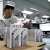 Một dây chuyền sản xuất iPhone 5 của Foxconn. (Nguồn: scrapetv.com)