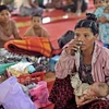 Những người mất nhà trong các cuộc xung đột giáo phái lánh nạn tại trại tị nạn ở bang Rakhine. (Nguồn: AFP/TTXVN)