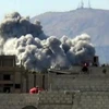 Khói lửa bốc lên trong cuộc xung đột ở Ghouta, gần Damascus. (Nguồn: AFP/TTXVN)